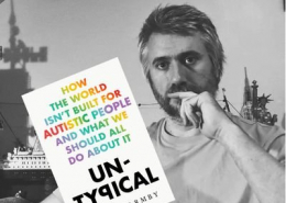 picture of white man with a beard, holding a book called Un-typical