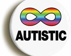 rainbow infinity symbol on a badge with text autistic